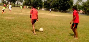 The players practice on sand barefoot cause of financial constraints